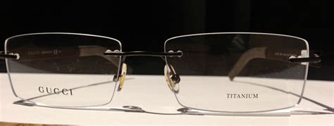 gucci titanium rimless glasses|Gucci frameless glasses men.